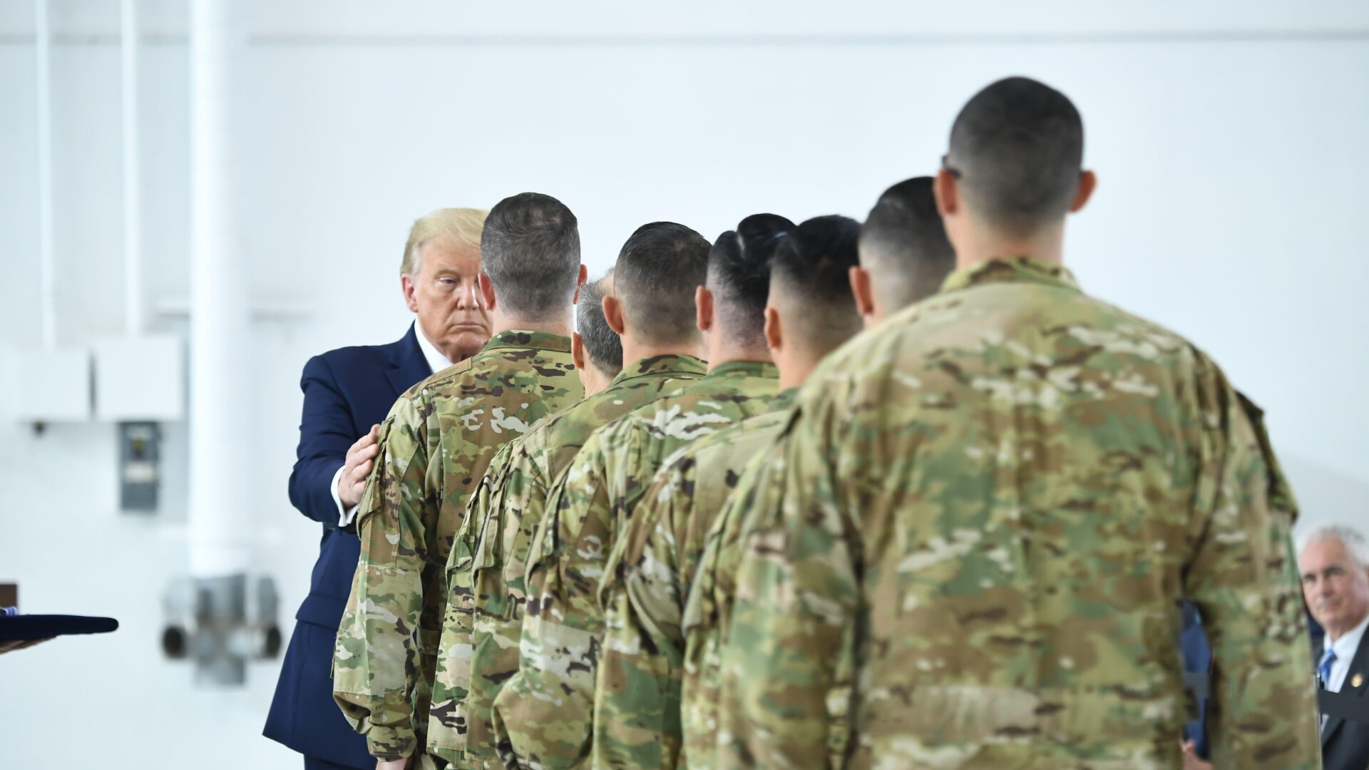U.S. President Donald Trump awards the Distinguished Flying Cross to pilots and crew members of the California Army National Guard who saved 242 lives from the wildfires on Sept. 14, 2020.