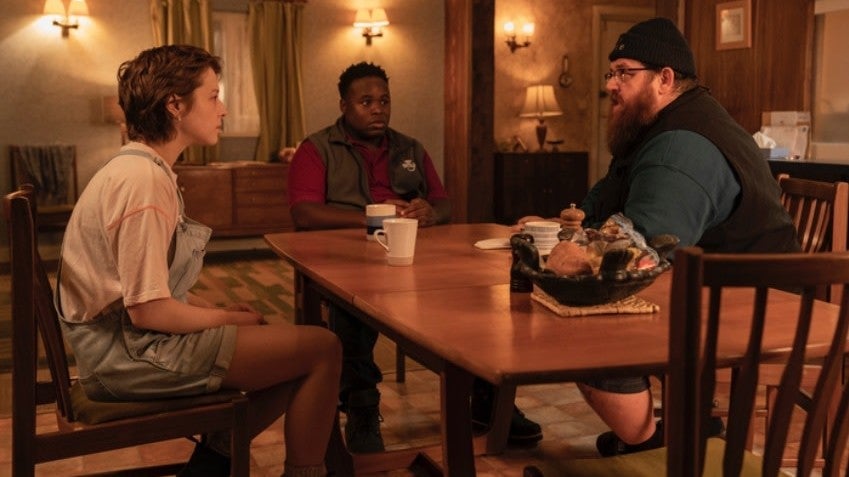 Astrid, Elton, and Gus have a team meeting.