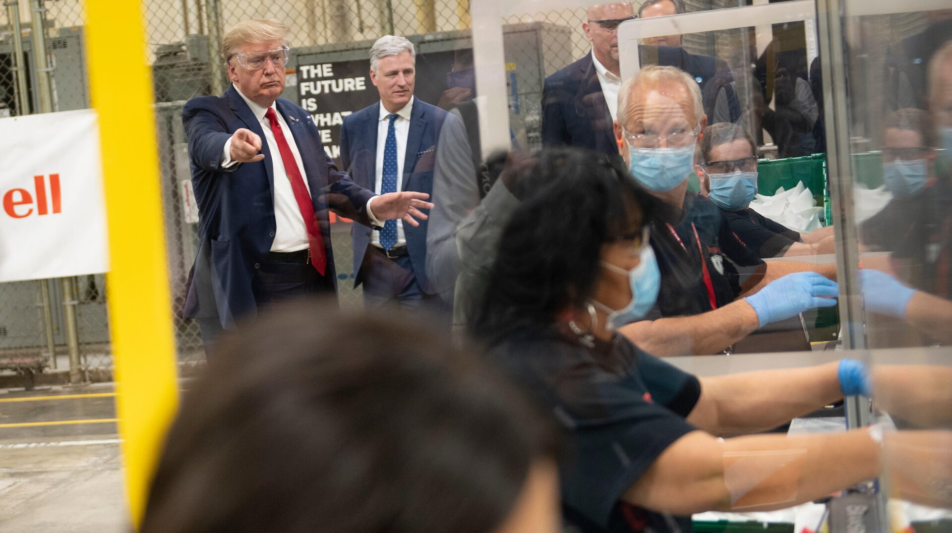 U.S. President Donald Trump tours a Honeywell International Inc. factory producing N95 masks during his first trip since widespread COVID-19 related lockdowns went into effect May 5, 2020