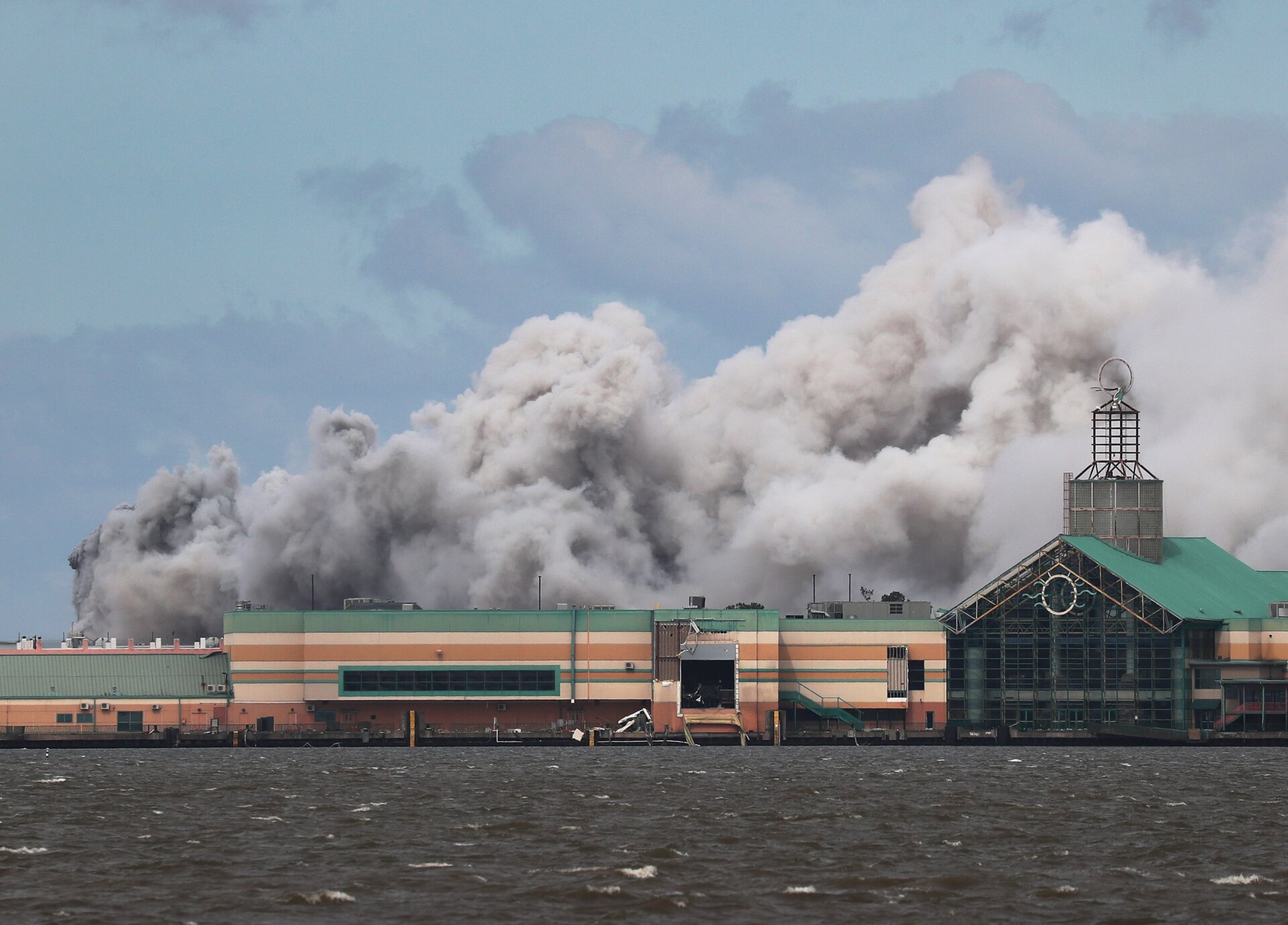 Smoke is seen rising from what is reported to be a chemical plant fire after Hurricane Laura passed through the area on Aug. 27, 2020 in Lake Charles, Louisiana. The hurricane hit with powerful winds causing extensive damage to the city.