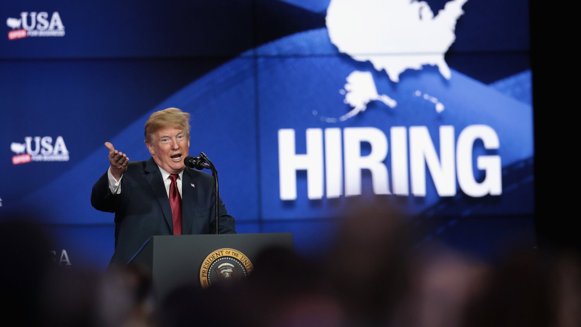 President Donald Trump speaks to guests during a groundbreaking ceremony for the $10 billion Foxconn factory complex on June 28, 2018 in Mt. Pleasant, Wis.