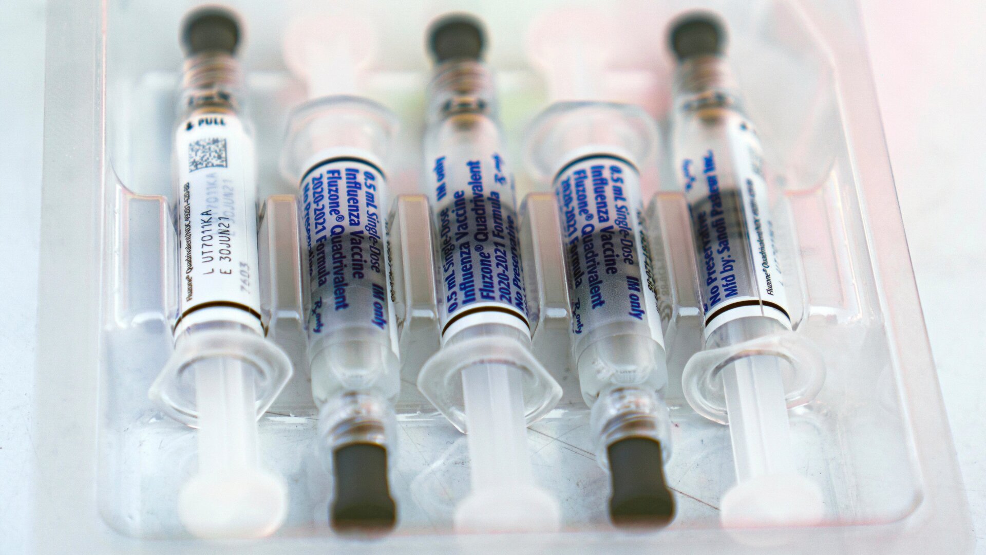 A box of influenza vaccines, about to be used during a free vaccination event in Los Angeles, California held October 17, 2020.