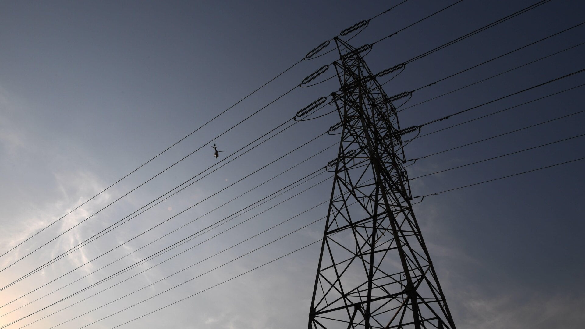 Electrical power line towers are seen in Los Angeles in mid-August during a triple-digit heatwave gripping the area.