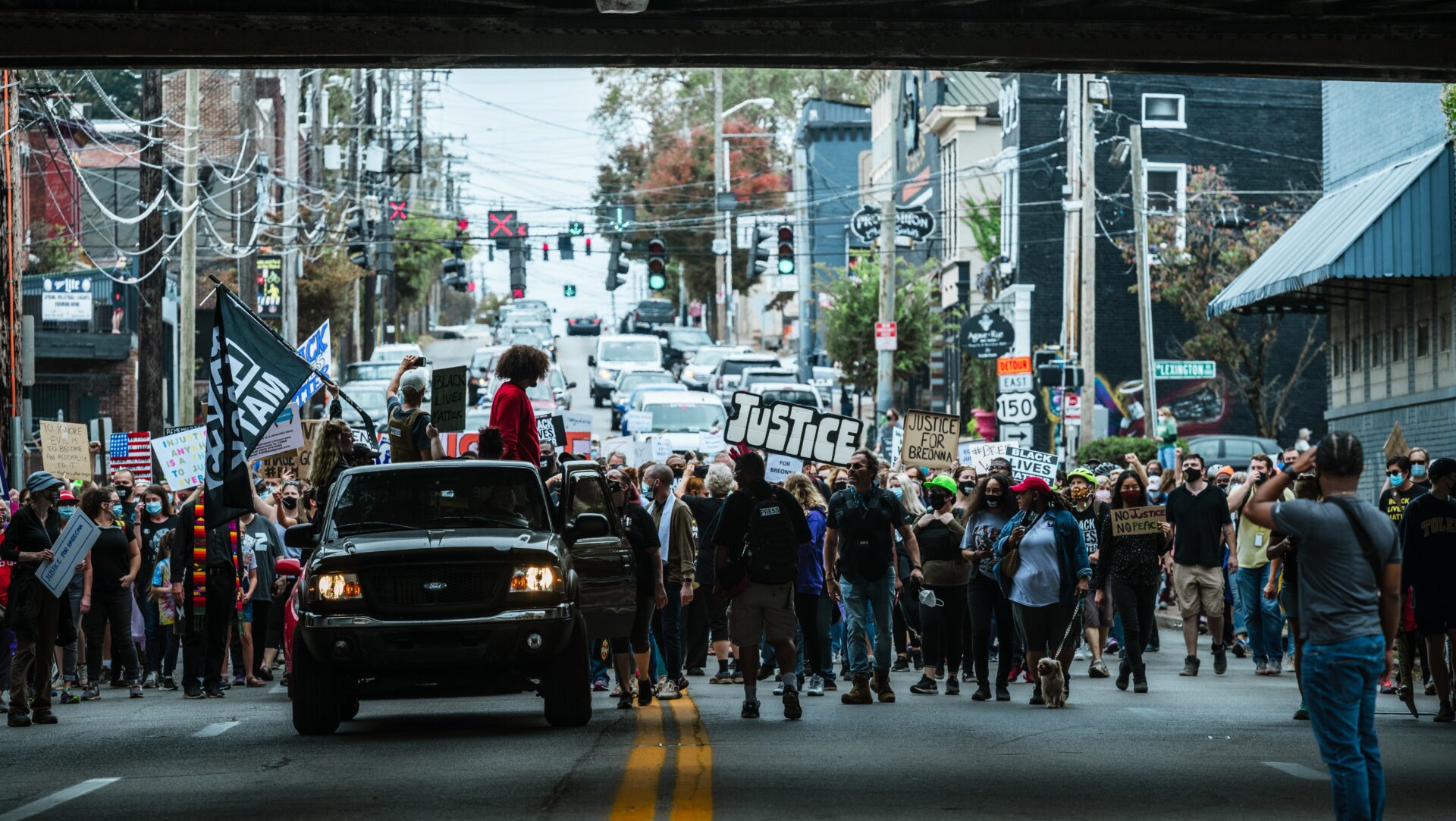 A group of protesters gathers in the street in a march to the Breonna Taylor memorial at Jefferson Square Park on October 10, 2020 in Louisville, Kentucky.