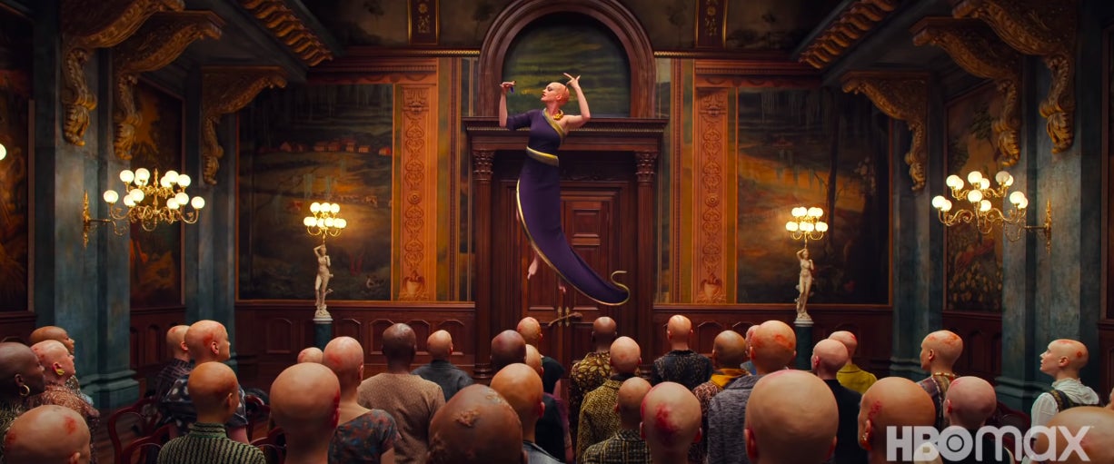 The Grand High Witch revealing her plan to the other witches.