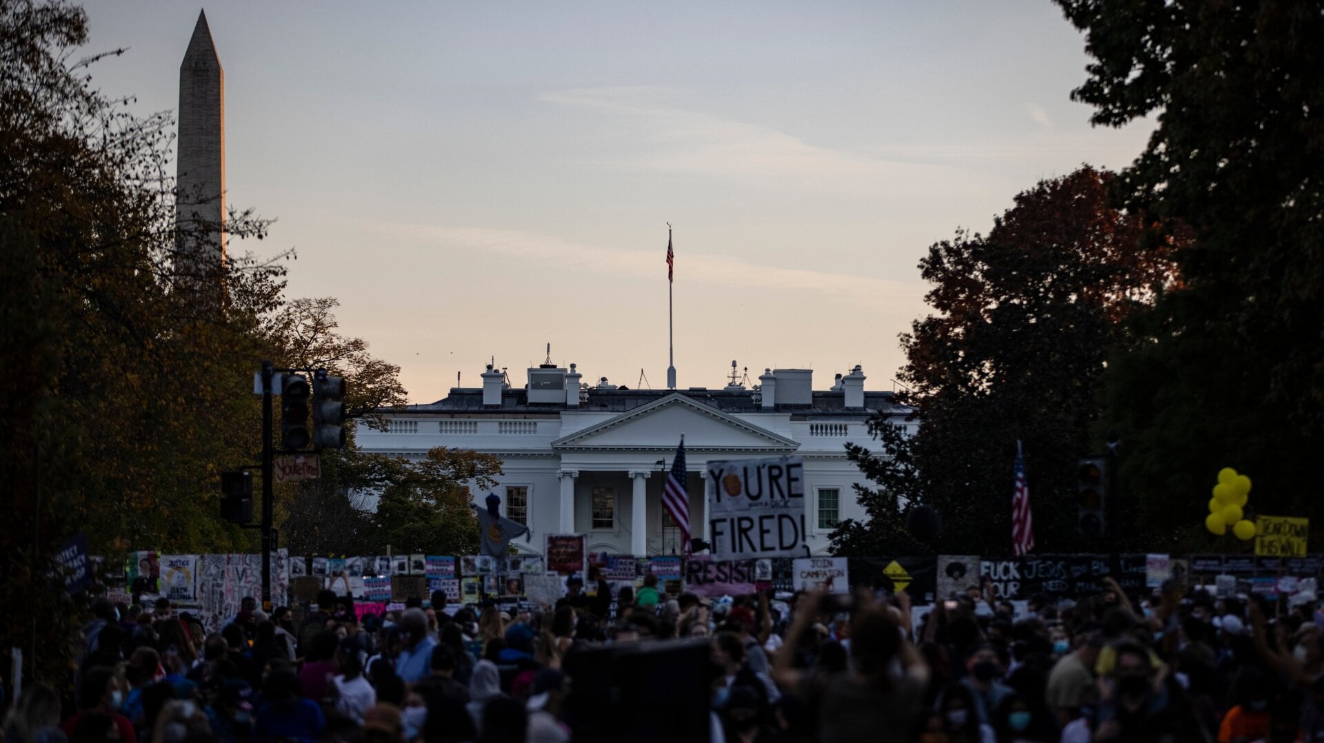 Supporters gather at Black Lives Matter Plaza near the White House on Sunday, the day after outlets called the presidential race for President-elect Joe Biden.