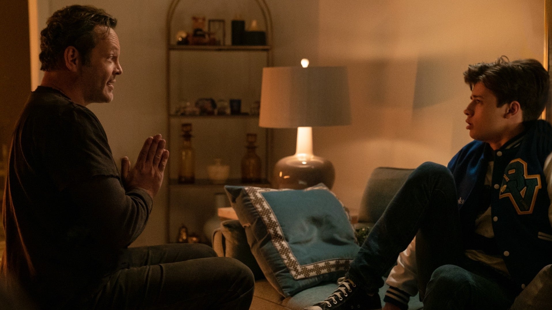 Vaughn’s Millie explains to her crush, Booker (Uriah Shelton), just what’s going on.