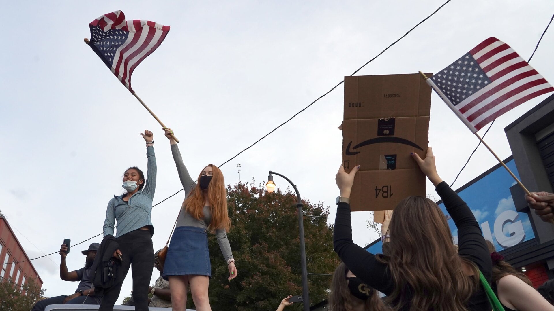 Demonstrators celebrate after Joe Biden was declared the winner of the 2020 presidential election on November 7, 2020, in Atlanta, Georgia.