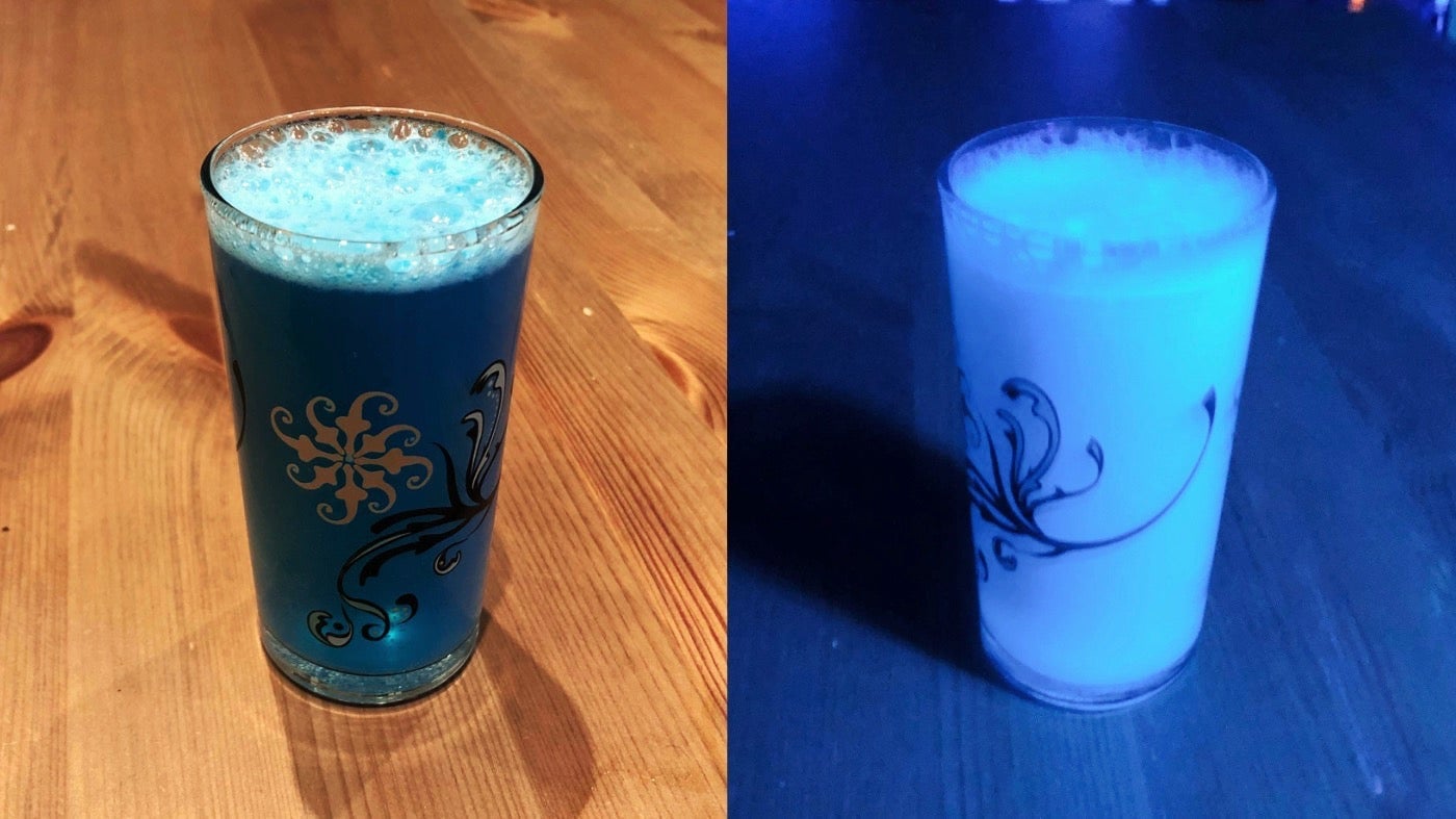 I made mine without the fizz because of the salmonella risk with egg whites. Glows in the black light just as well, though!