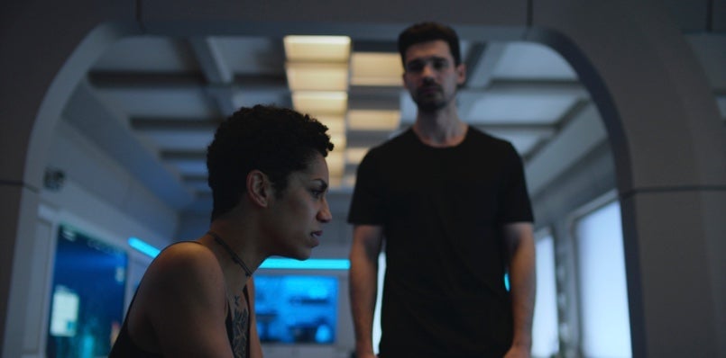 Naomi (Dominique Tipper) and Holden (Steven Strait) aboard the Roci in season five.