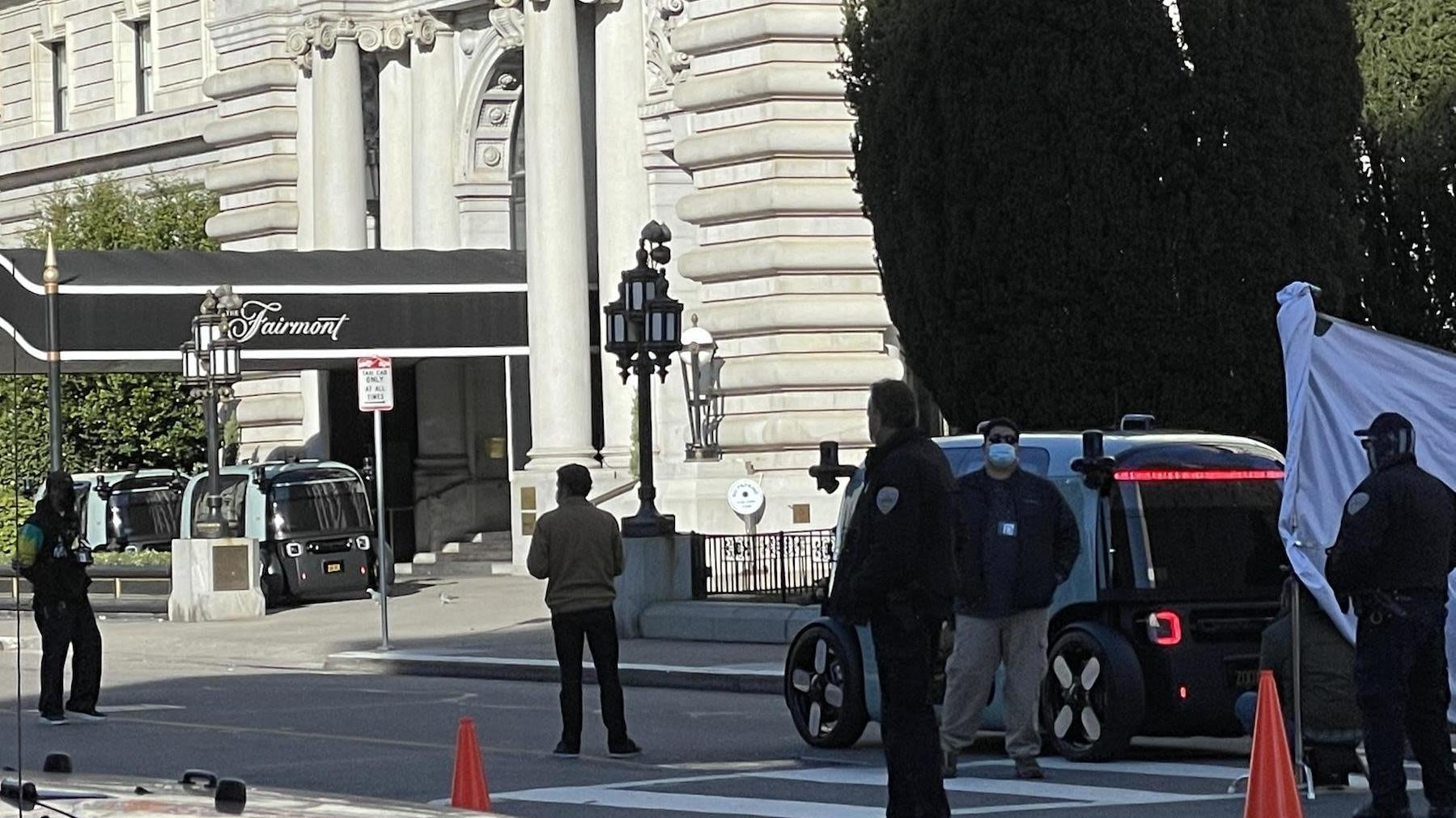 What appears to be a Zoox self-driving taxi on the streets of San Francisco this weekend, with several others visible in the background.