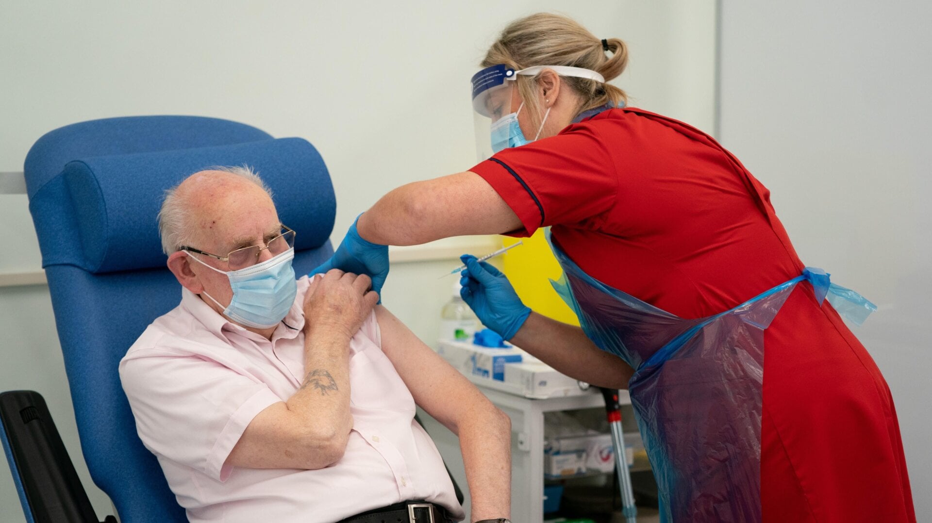 George Dyer, 90, receives a dose of the Pfizer/BioNTech covid-19 vaccine at Croydon University Hospital in south London on December 8, 2020.