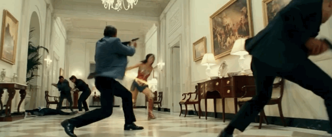 Wonder Woman dispatching some men with her Lasso of Truth.