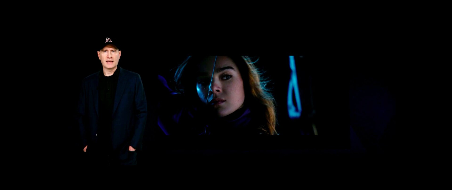 Kevin Feige in front of Hailee Steinfeld as Kate Bishop.