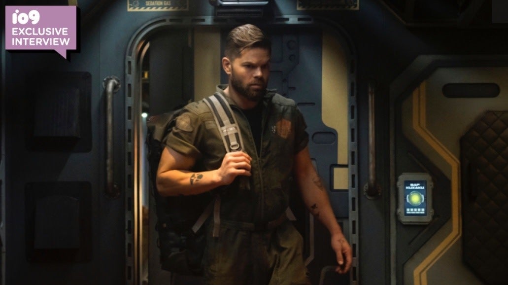 Amos Burton (Wes Chatham) heads to Earth in season five.