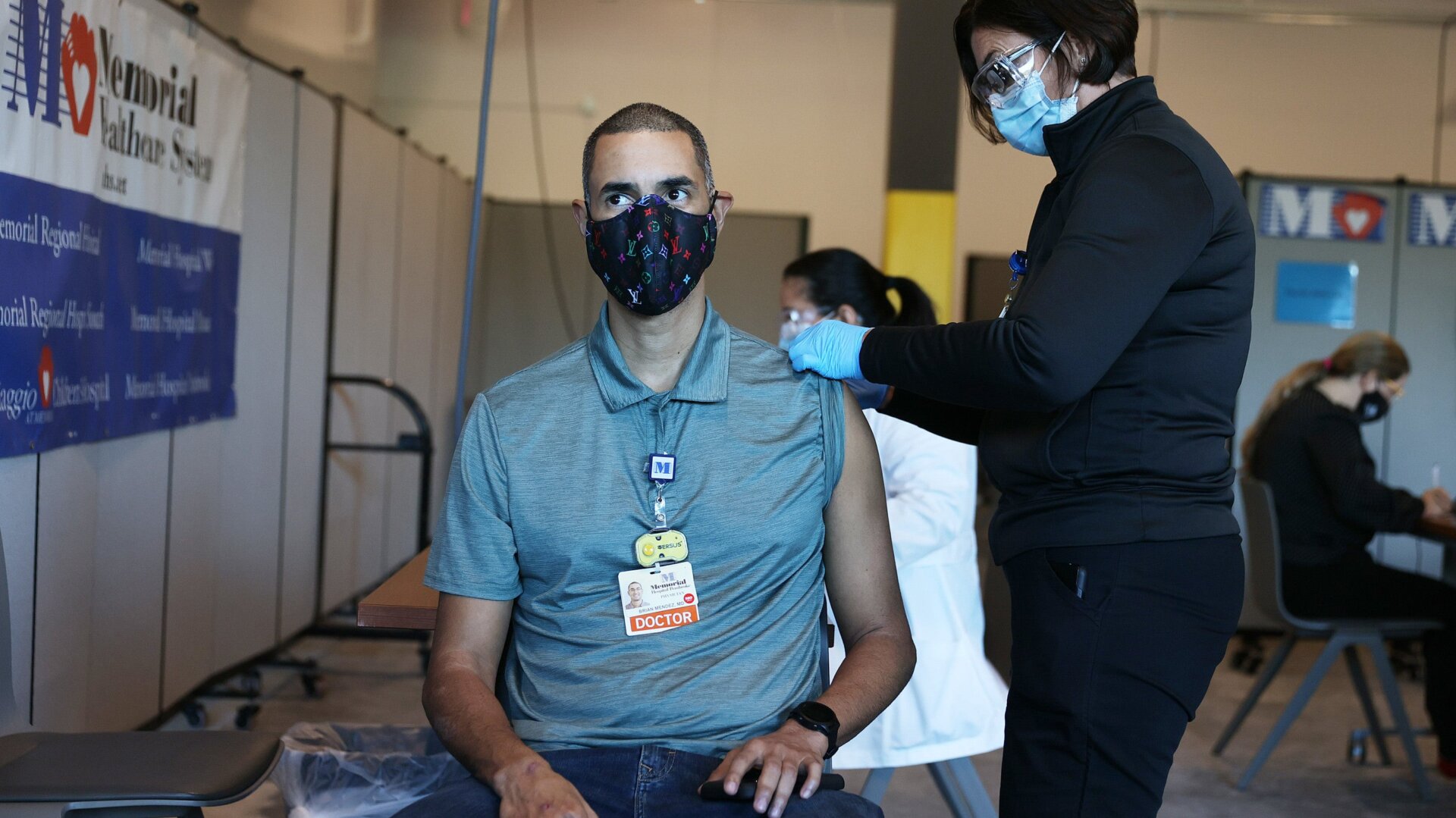 Brian Mendez, MD at the Memorial Healthcare System, receives a Pfizer-BioNtech covid-19 on December 14, 2020 in Miramar, Florida.