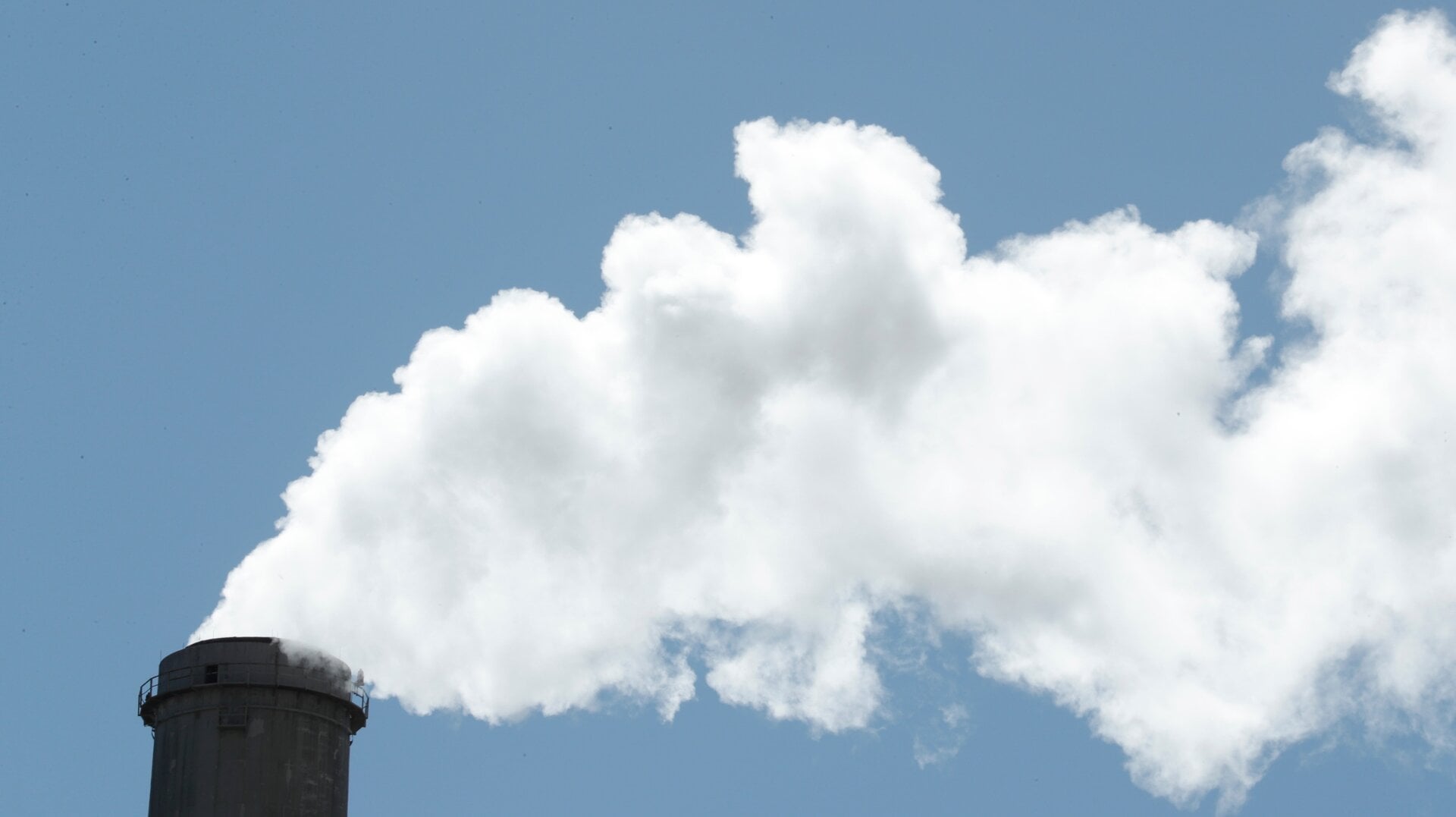 Emissions rise out of a large smoke stack at Pacificorp’s 1000 megawatt coal fired power plant on Oct. 9, 2017 outside Huntington, Utah.