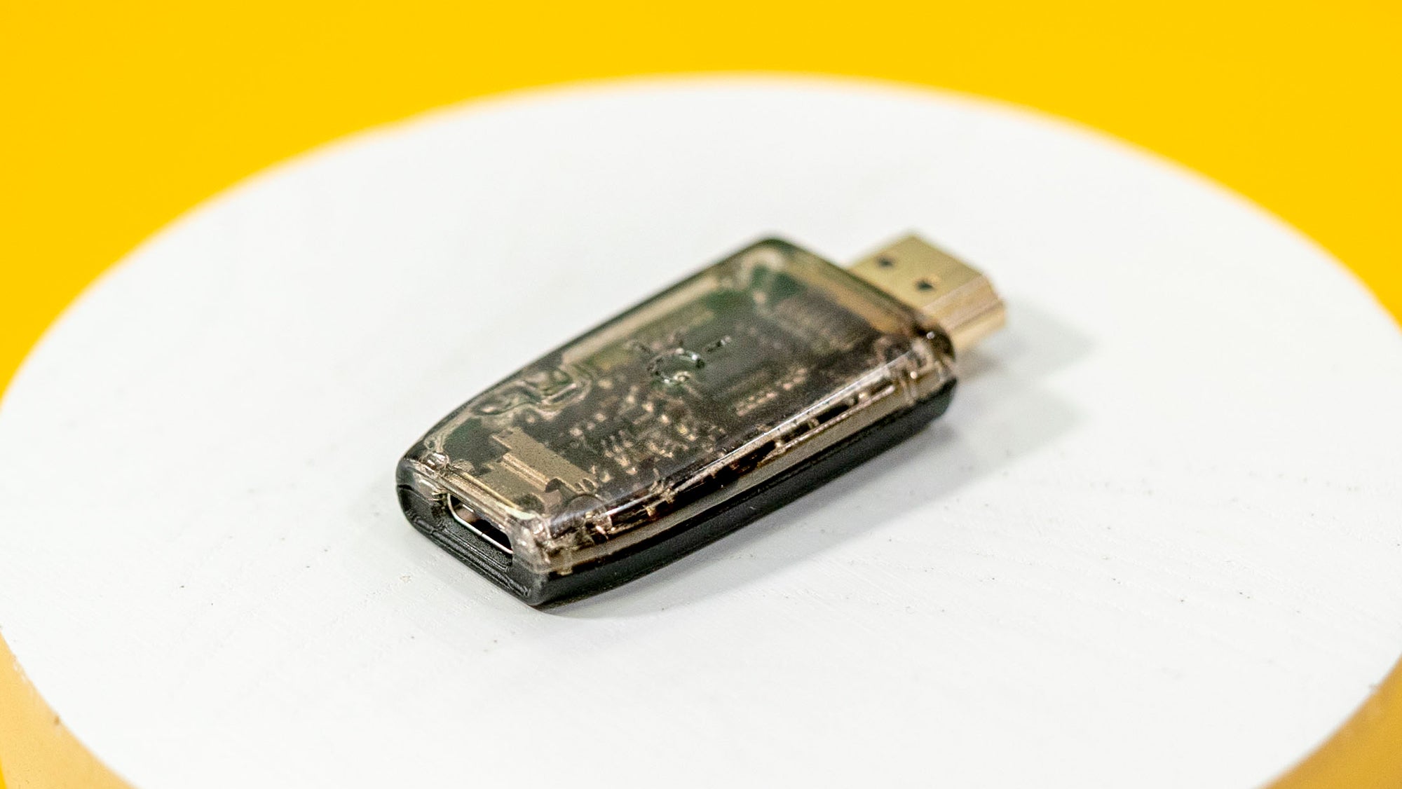 The tiny Genki ShadowCast dongle down converts up to 4K HDMI video signals so they can be displayed on a laptop’s screen via USB-C.