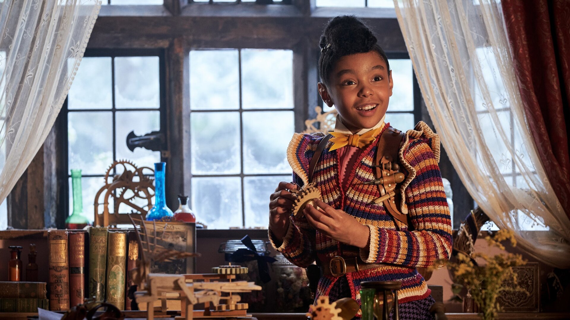 Journey (Madalen Mills) checks out her grandpa’s workshop. 