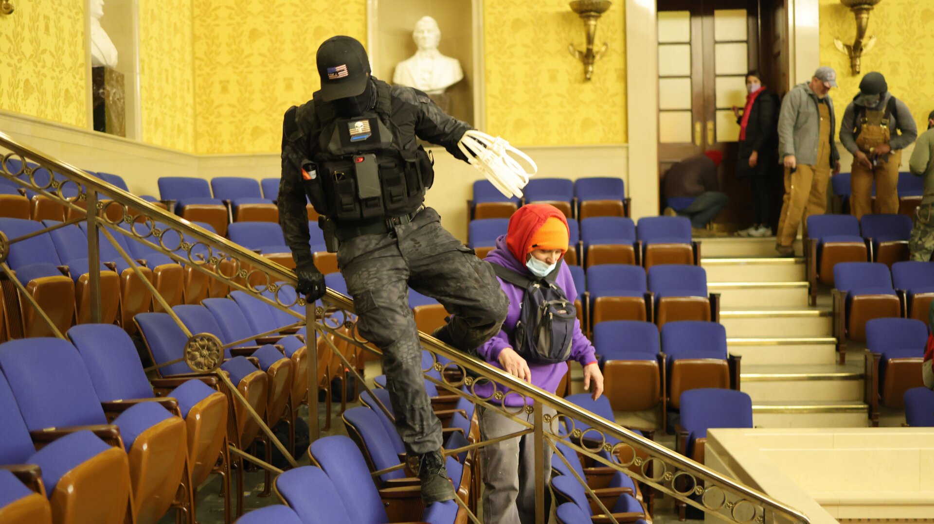 A Trump supporter with zip ties in the Senate Chamber on January 06, 2021 in Washington, DC.