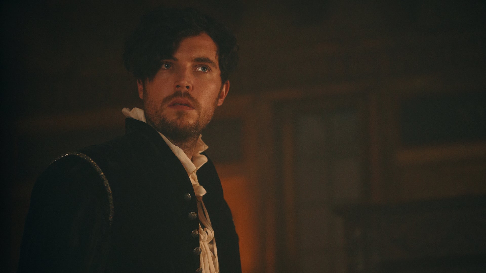 Tom Hughes and his bangs as “Kit” Marlowe.