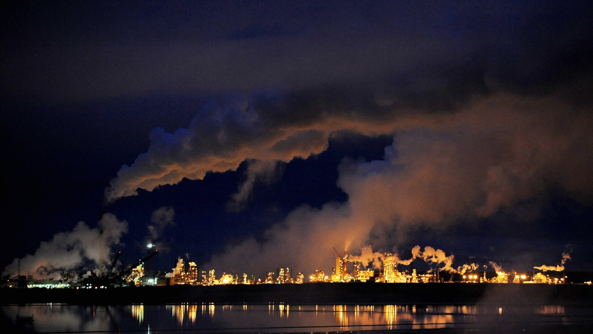 A night view of the Syncrude oil sands extraction facility near the town of Fort McMurray, Alberta.