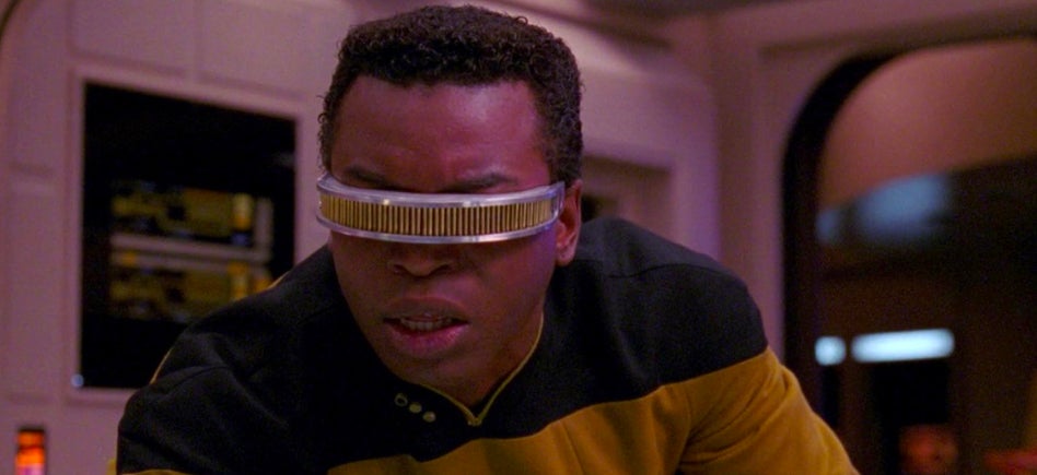Geordi LaForge reading Twitter.