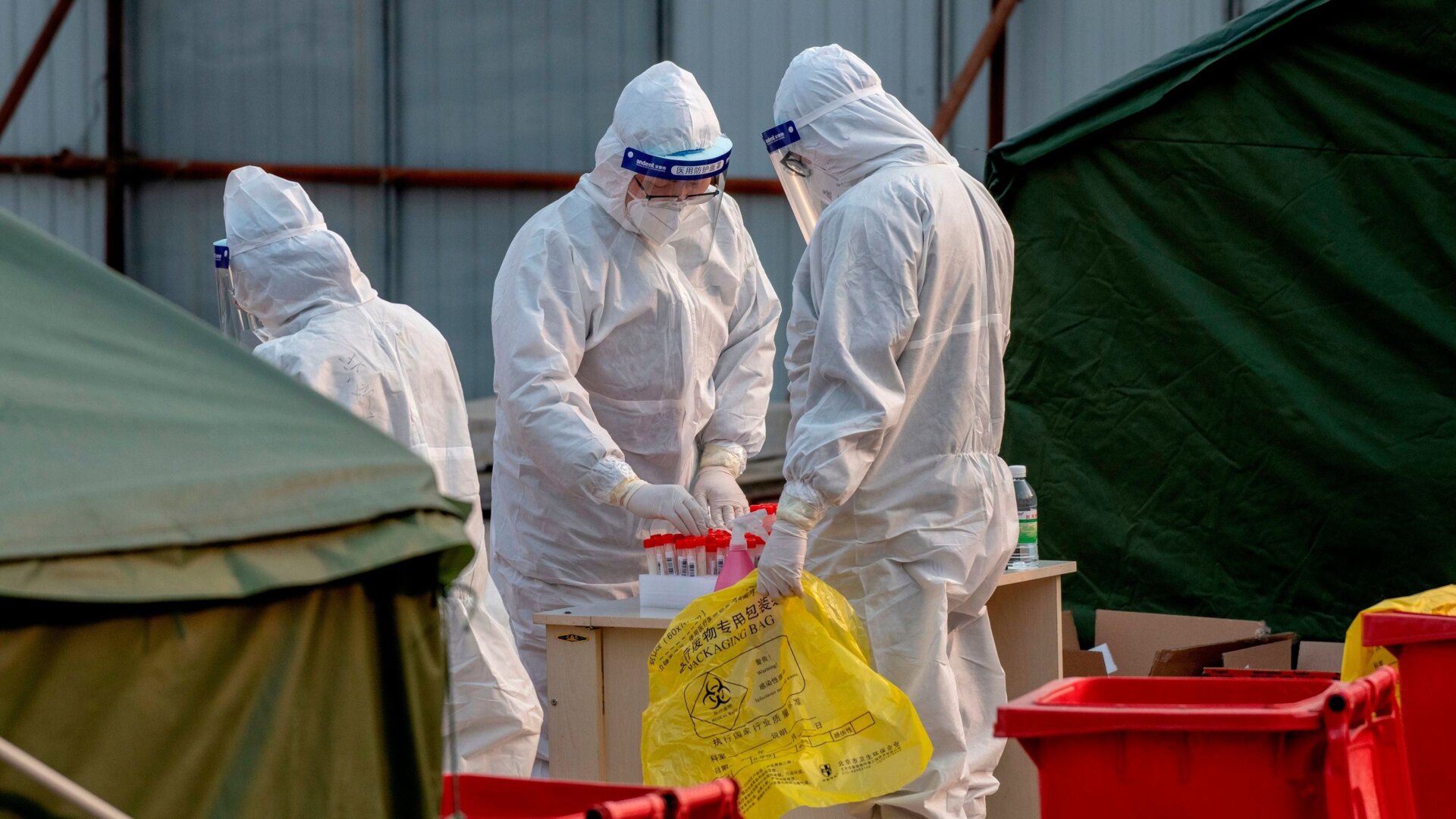 Medical workers are seen at a Covid-19 coronavirus testing site in Beijing on January 23, 2021.