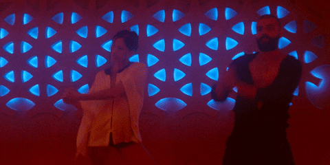 Sonoya Mizuno and Oscar Isaac serving moves in Ex Machina.