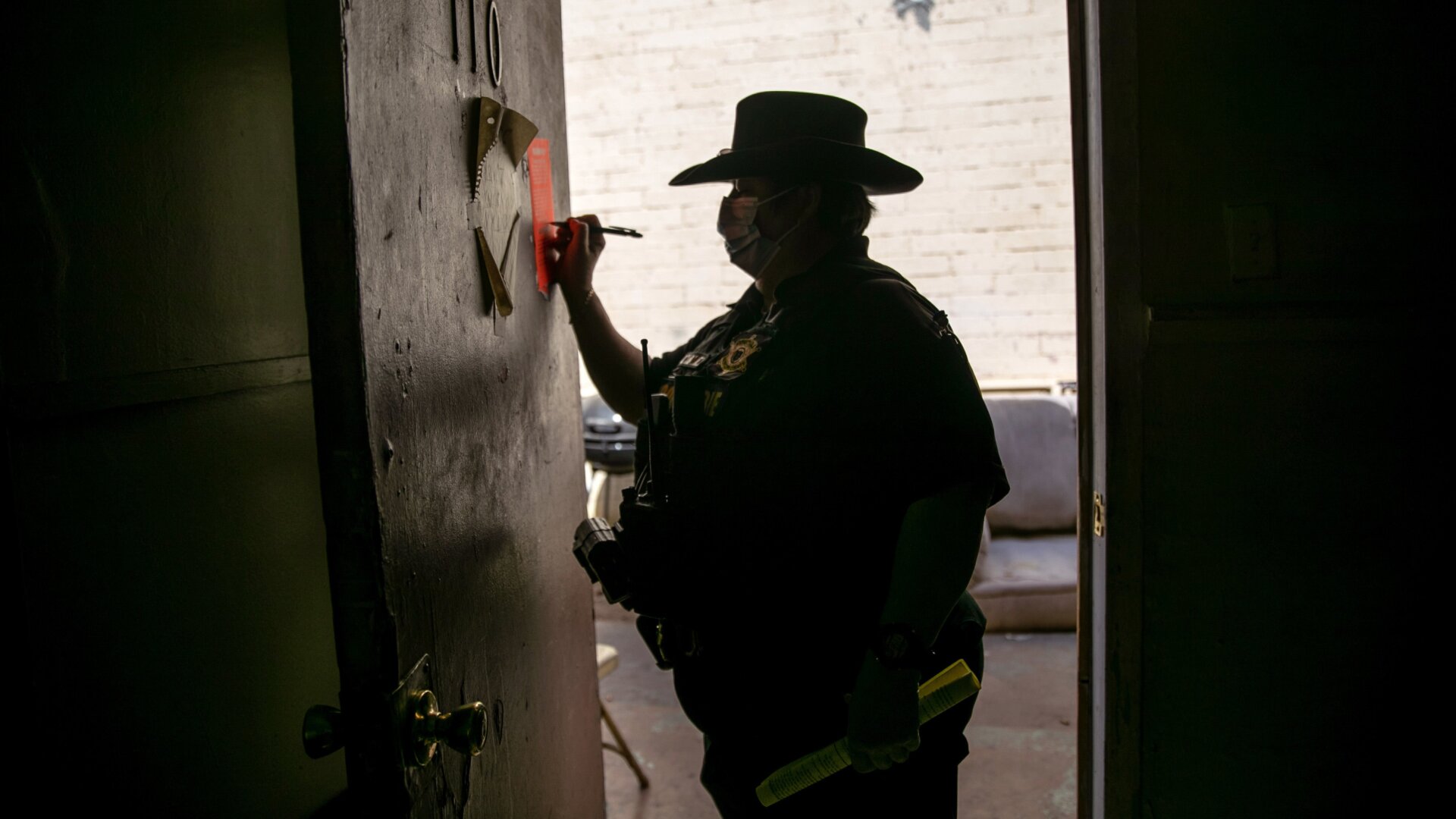 File photo of Maricopa County constable Darlene Martinez signing an eviction order on October 7, 2020 in Phoenix, Arizona.