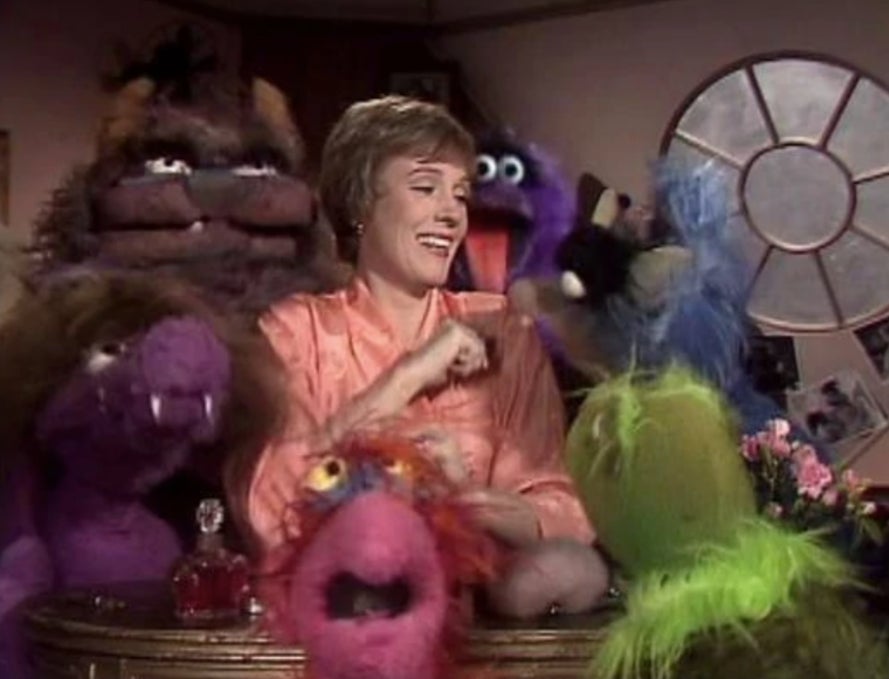 Julie Andrews enjoying herself with the Muppets.