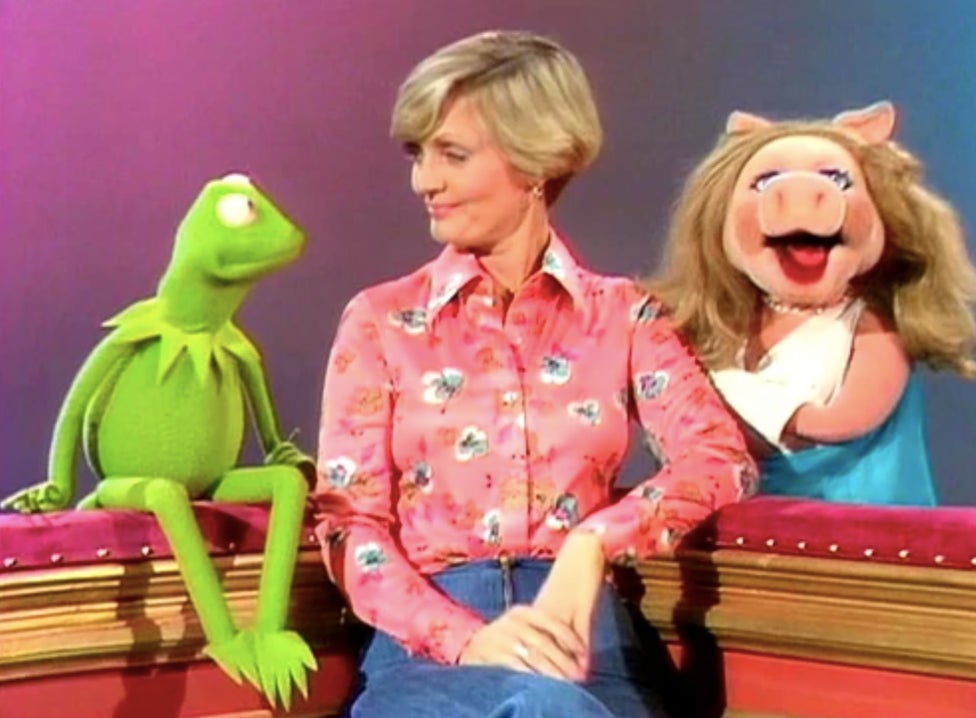 Piggy taking issue with Florence Henderson talking with Kermit.