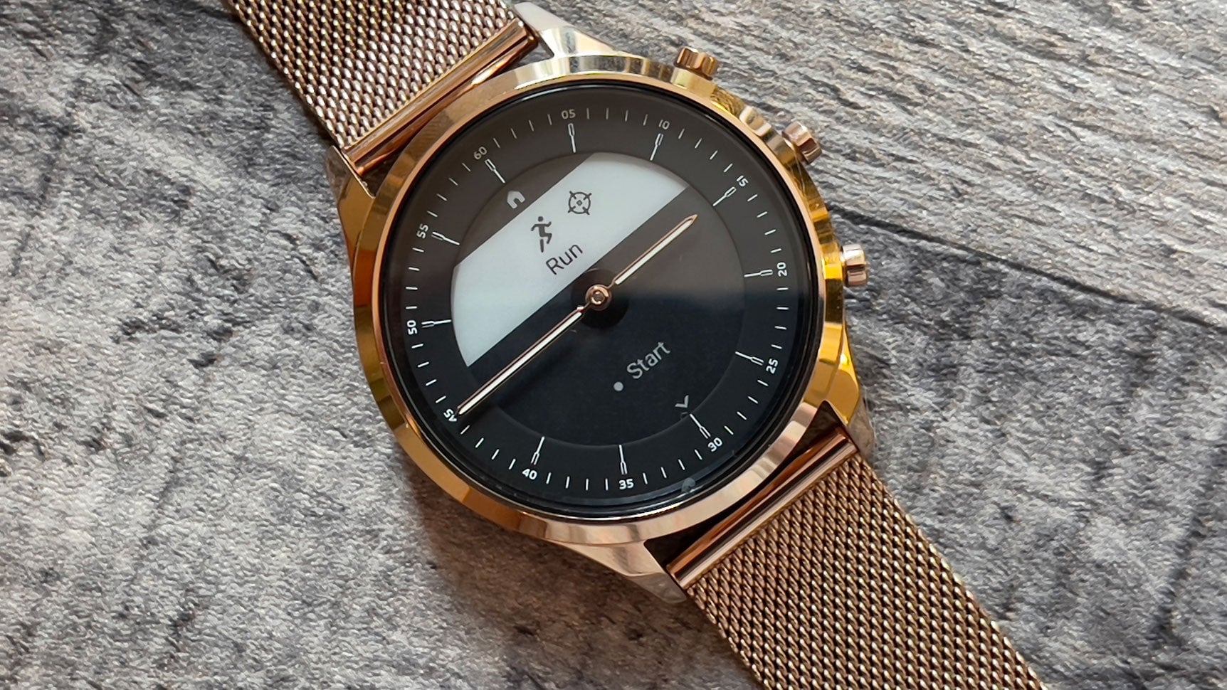 The hands move to 3 and 9 when you’re browsing screens so you can more easily read notifications and menus.