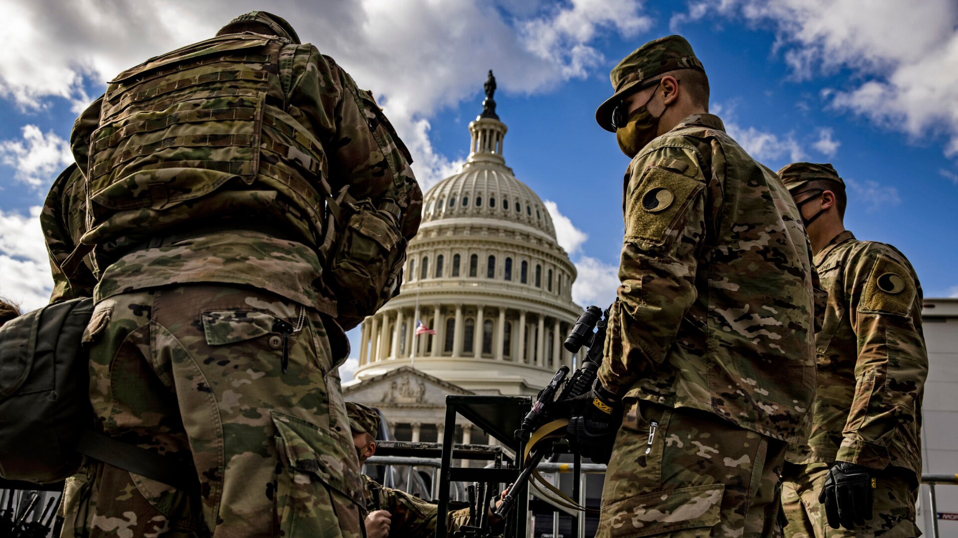Virginia National Guard soldiers are issued their M4 rifles and live ammunition on the east front of the U.S. Capitol on January 17, 2021.