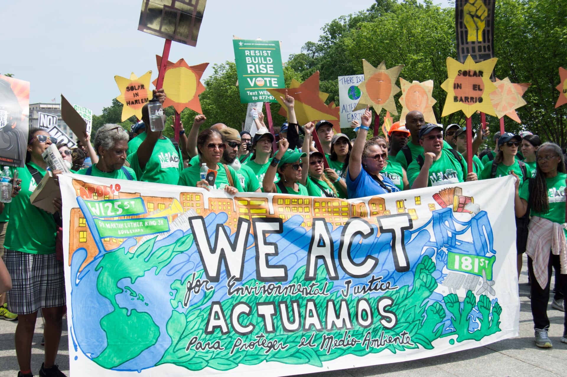 Shepard (center) marches at the People’s Climate March in 2017.