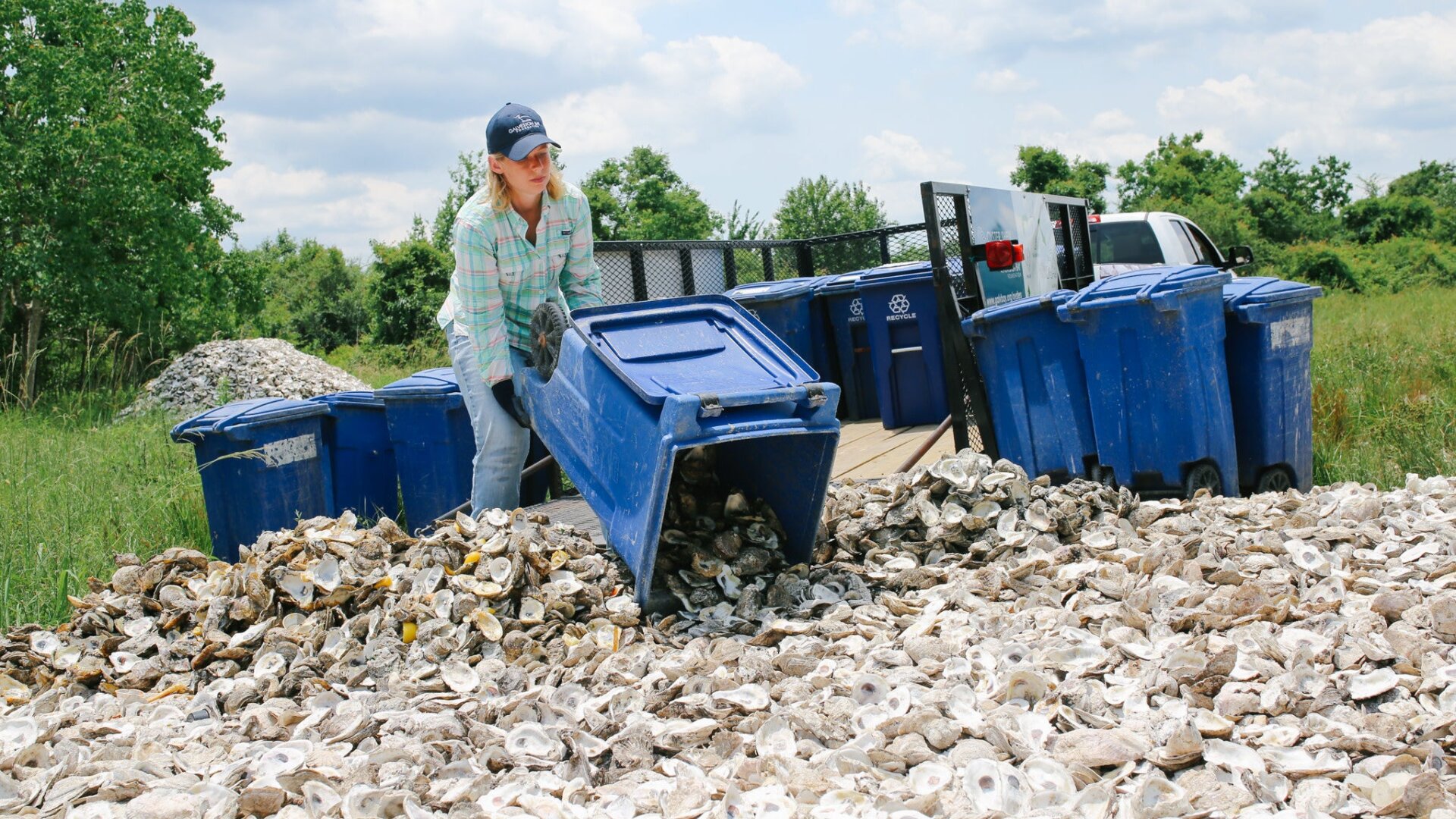 Shannon Batte, habitat restoration technician at the Galveston Bay Foundation, at a curing site.