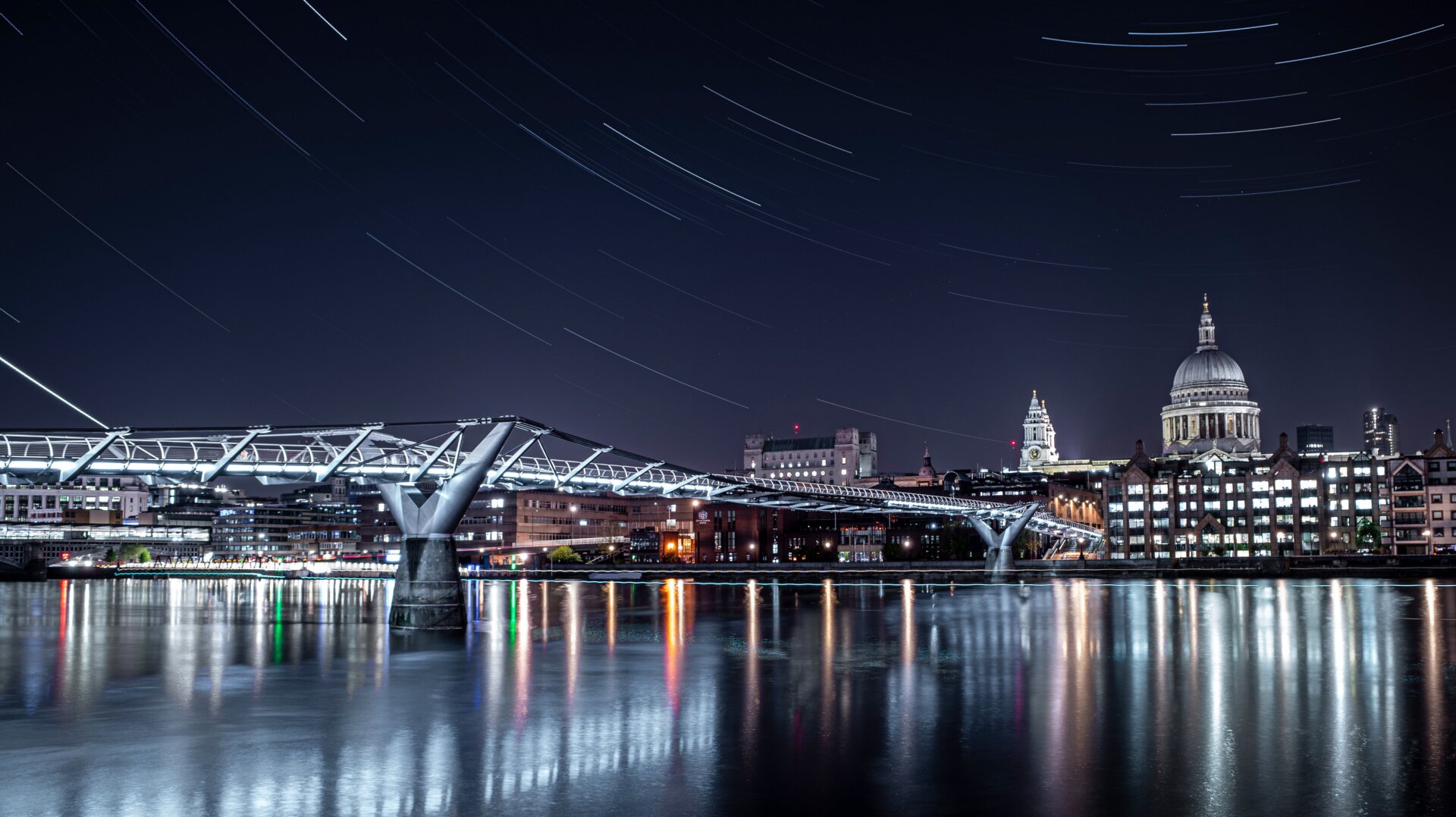 In this multi-exposure picture, the London Millennium Footbridge is illuminated under the stars on a clear night on April 21, 2020 in London. The clear skies created by the new moon coincide with the Lyrid meteor shower, an annual display caused by the Earth passing through a cloud of debris from a comet called C/186 Thatcher.