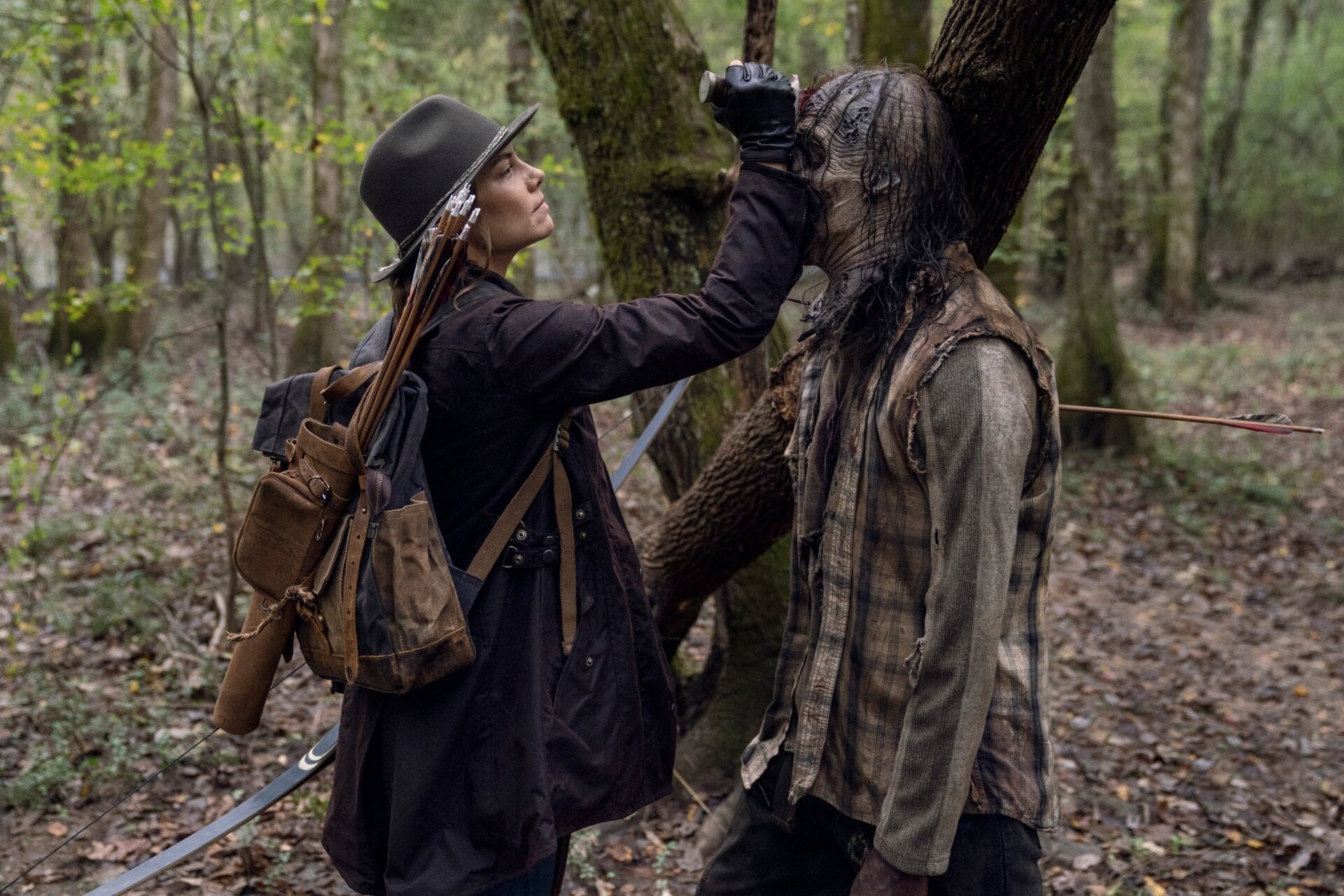 Maggie, uh, gently lays her forearm on a zombie’s face.