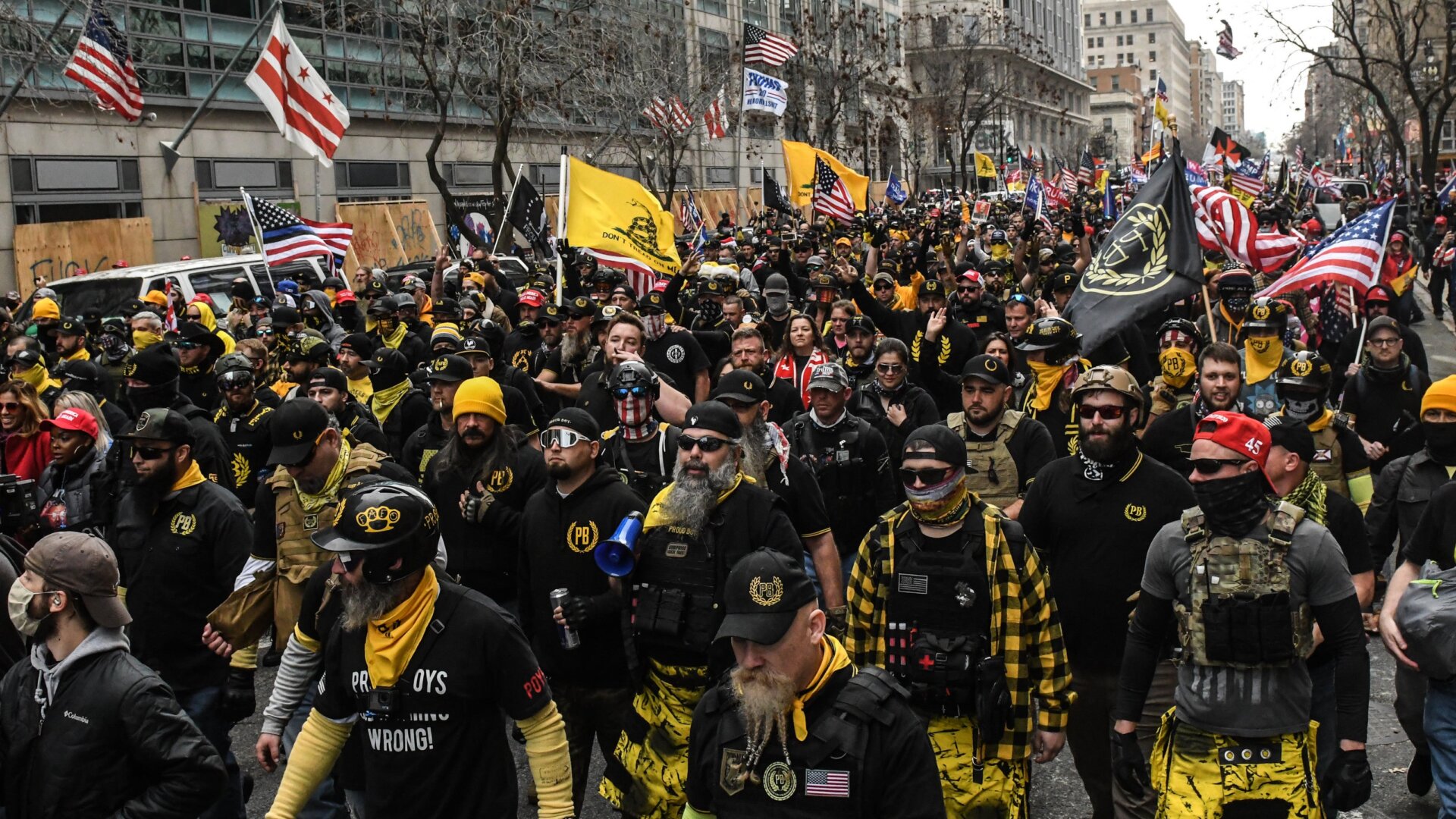 Members of the Proud Boys march towards Freedom Plaza during a protest on December 12, 2020 in Washington, DC. Thousands of protesters who refuse to accept that President-elect Joe Biden won the election are rallying ahead of the electoral college vote to make Trump’s 306-to-232 loss official.