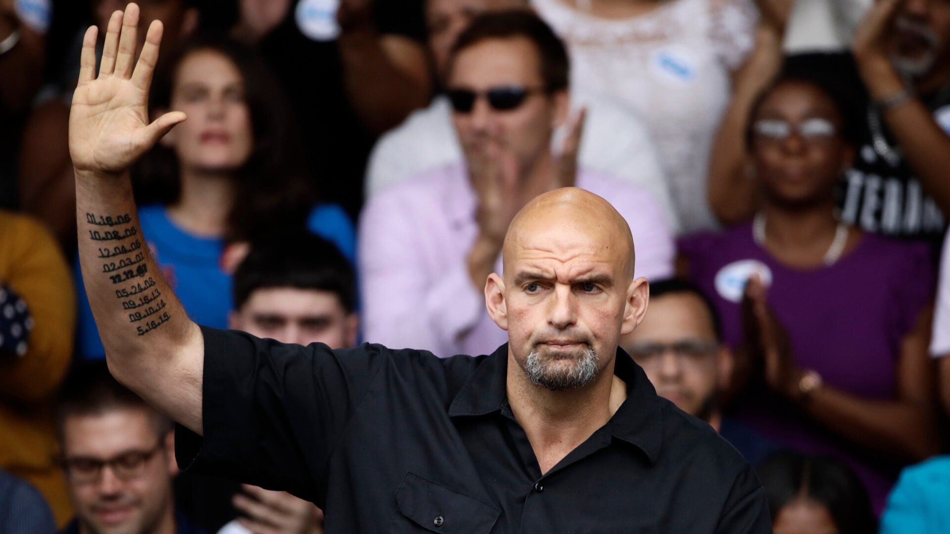 John Fetterman speaks at a campaign rally for Pennsylvania candidates in Philadelphia in 2018.