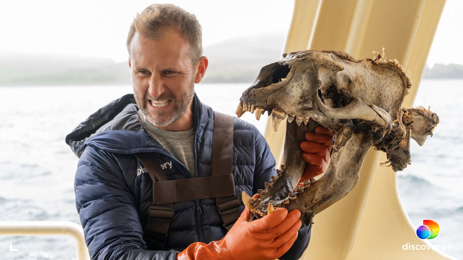Ian Shive poses with a sea lion skull.