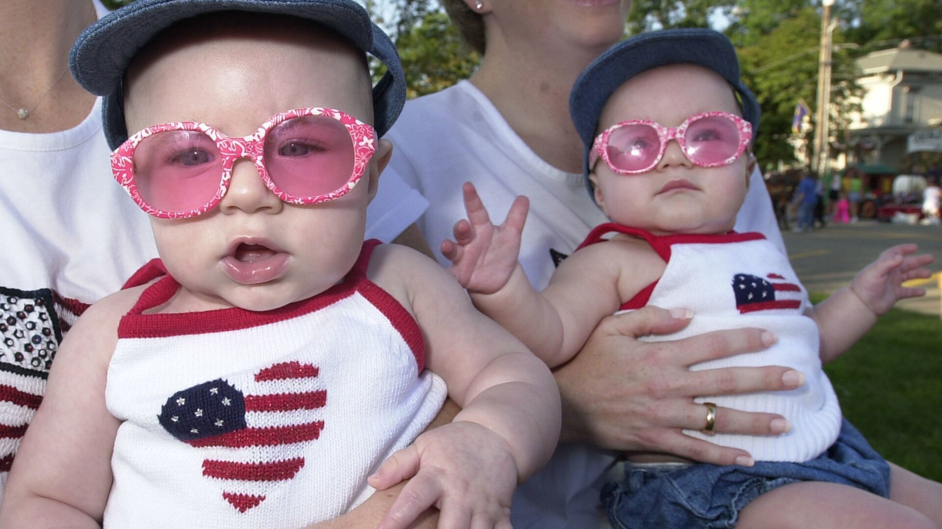 7-month-old twins  taking part in the Double Take Parade held August 3, 2002 at the Twins Days Festival in Twinsburg, Ohio.