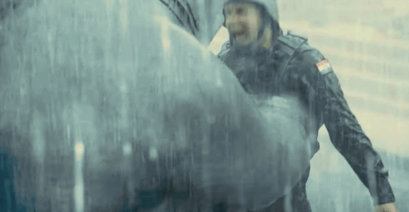 King Shark tearing into a goon.