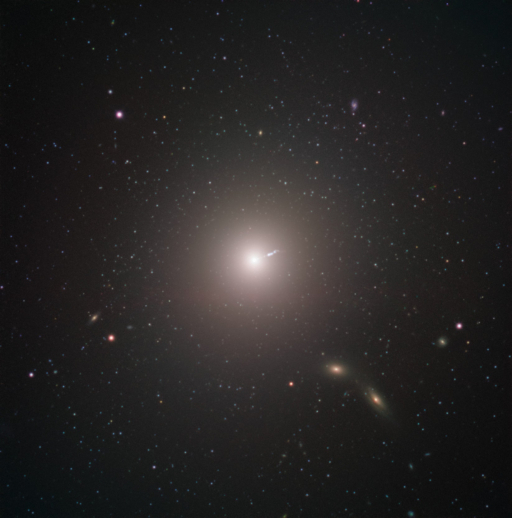 The galaxy Messier 87 (center), which contains the black hole imaged by the Event Horizon Telescope. 