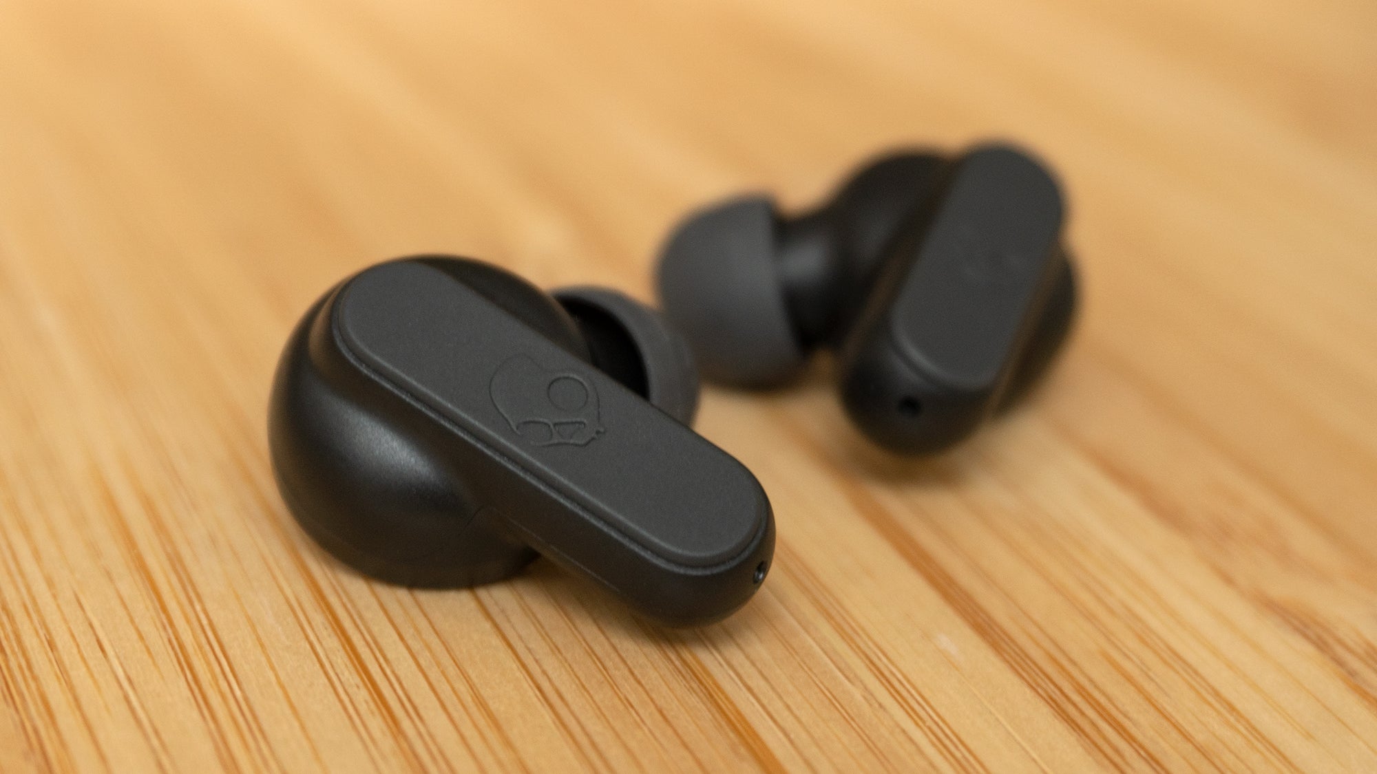 Each earbud has a physical button (you press on the tiny Skullcandy skull logo) that can be pressed in various ways to access shortcuts, but be prepared to study the included manual, or just keep your phone in hand all the time.