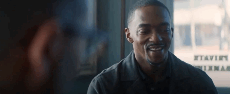 Sam and a loan officer having a laugh.