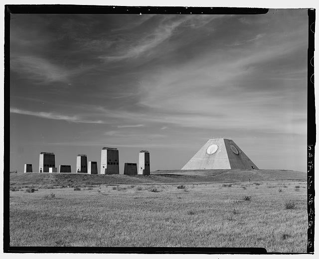 East oblique of missile site control building, with better view of exhaust (the taller columns) and intake shafts - Stanley R. Mickelsen Safeguard Complex.