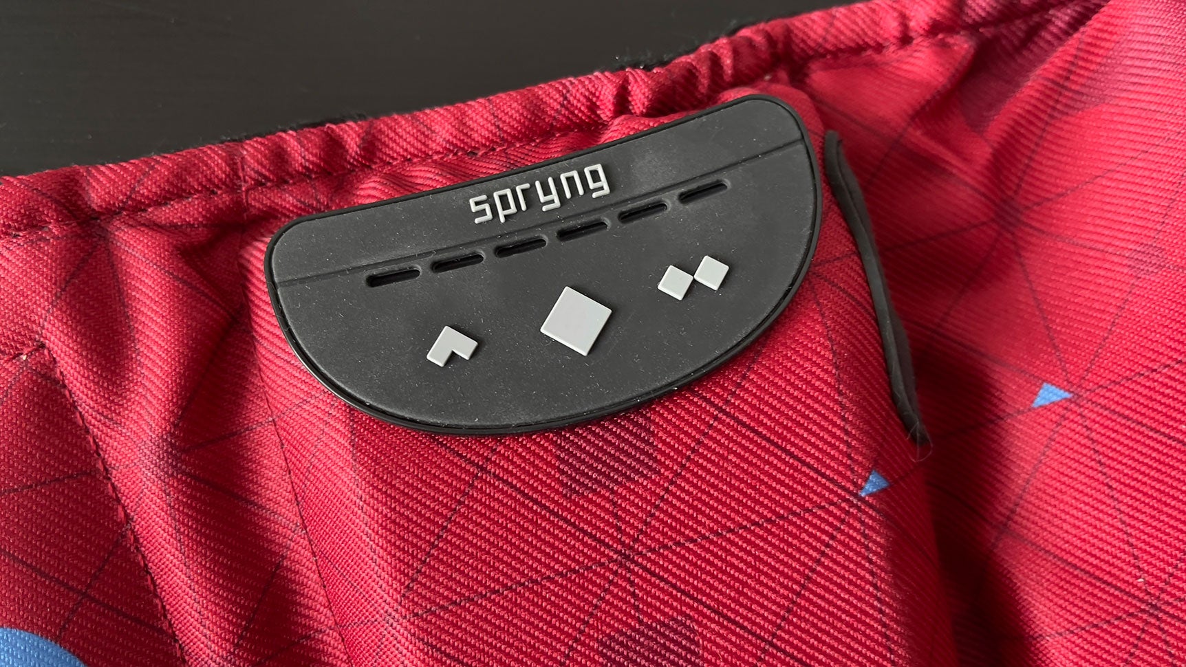 The controls: middle diamond turns the device on and off, double diamond toggles between patterns, and the carat button shifts between intensity levels.