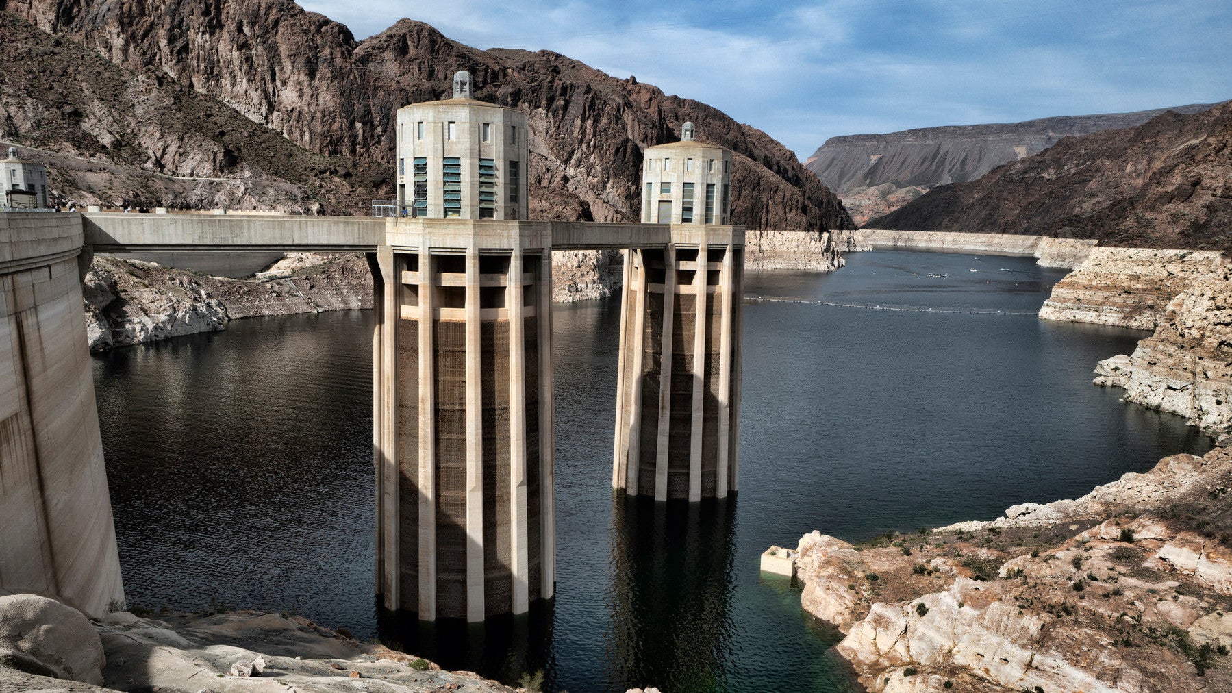 A bathtub ring of light minerals shows the high water mark of the reservoir which has shrunk to its lowest point on the Colorado River, as seen from the Hoover Dam.