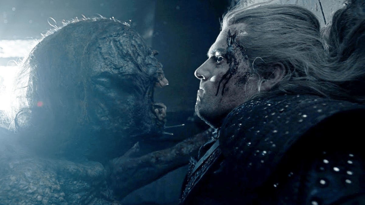 Pictured, left to right: A monster and Henry Cavill as Geralt. Not pictured: Laurence O’Fuarain.